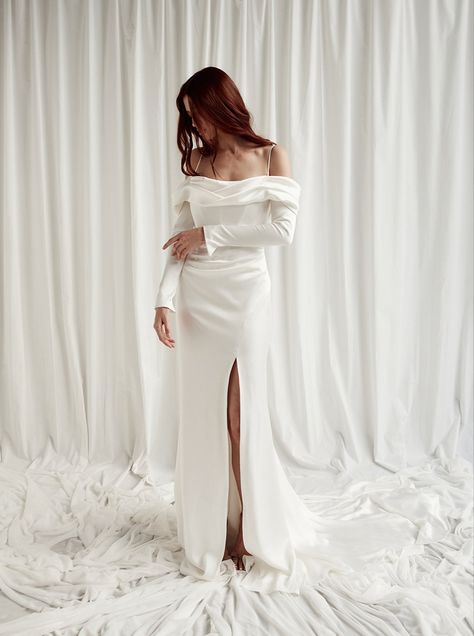 Silk satin off the shoulder long sleeve fit and flare mermaid modern wedding dress Wedding Dress Spaghetti Straps, Simple Wedding Dress With Sleeves, Flare Wedding Dress, Fit And Flare Wedding Dress, Satin Wedding Dress, Vegas Wedding, Dress Spaghetti, Satin Wedding, Simple Wedding