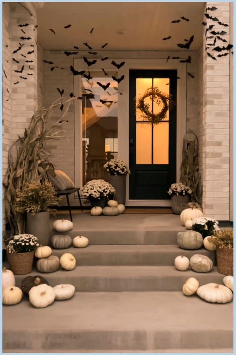 outdoor halloween decorations Halloween Fall Decor Outdoor, Hanging Bats For Halloween Porch, Bats Outdoor Decor, Front Porch Bats Halloween, Hanging Bats Front Porch, Black And White Halloween Decor Porch, White Pumpkin Decor Front Porches, Modern Outdoor Halloween Decor, Bats Halloween Decorations