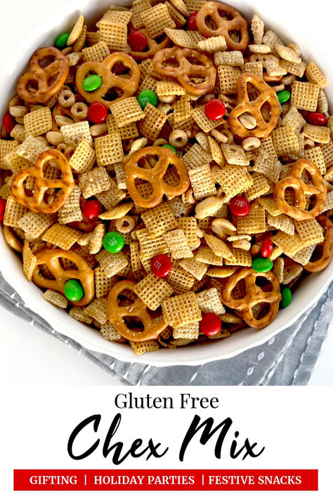 Gluten Free Chex Mix that uses green and red colorful candies in a large white serving bowl. Gluten Free Christmas Chex Mix Recipes, Gf Salty Snacks, Healthy Party Mix Recipe, Gluten Free Kid Snacks, Gluten Free Party Mix Recipe, Gf Chex Mix Recipe, Gluten Free Road Trip Snacks, Chex Mix Recipes Gluten Free, Gluten Free Trail Mix Recipes