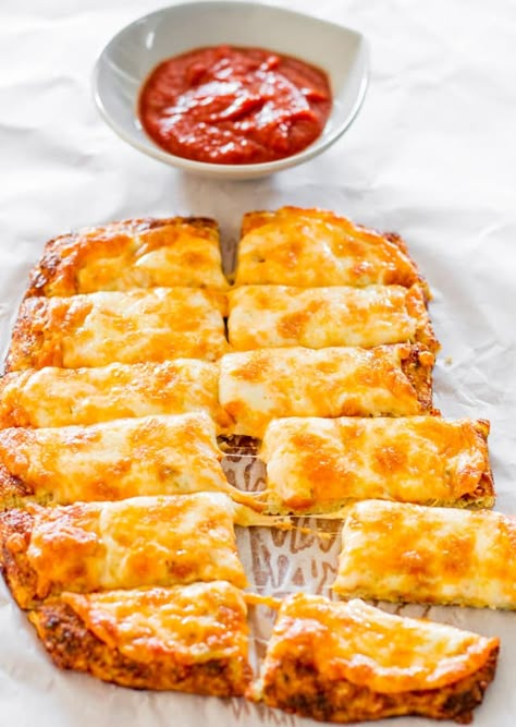 Cheesy Cauliflower Breadsticks - gluten free, low carb, cheesy cauliflower breadsticks! This recipe is a winner and a keeper! Best Cauliflower Recipe, Cauliflower Breadsticks, Cheesy Cauliflower, Passover Recipes, Low Carb Dinner Recipes, Weight Watcher Recipes, Favorite Comfort Food, Breadsticks, Low Carb Dinner