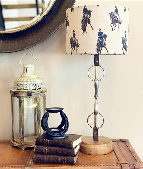 This Snaffle has been tastefully converted into a lamp. Mounted on a hand turned base with the Bridle leathers trimming the base and holding the snaffle in place. You can choose from a  variety of 3 equestrian themed shades An unusual piece to grace any country home. This lamp is handcrafted to order and may take 2 to 3 weeks for delivery. Horse Inspired Furniture, Equestrian Cottage Decor, Horse Office Ideas, Equestrian Decor Living Rooms, Equestrian Room Ideas, Equestrian Living Room, Horse Decor Living Room Equestrian Style, Equestrian Kitchen, Equestrian Room