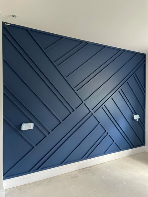 Navy Wood Paneling, Geometric Panelling Bedroom, Blue Wall Panelling Living Room, Blue Wood Panel Wall, Navy Blue Wall Paneling Bedroom, Navy Bedroom Panelling Wall, Navy Blue Bedroom With Wood Accent Wall, Navy Blue Paneling, Feature Wall Panelling Bedroom