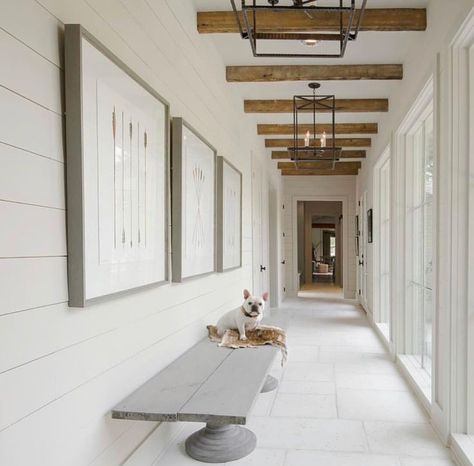 modern farmhouse entryway or hallway with wood beams and floor to ceiling windows Modern Farmhouse Hallway, Farmhouse Foyer, Farmhouse Hallway, Farmhouse Entry, Farmhouse Entryway, Apartment Decoration, Hallway Designs, Entryway Lighting, Hallway Design