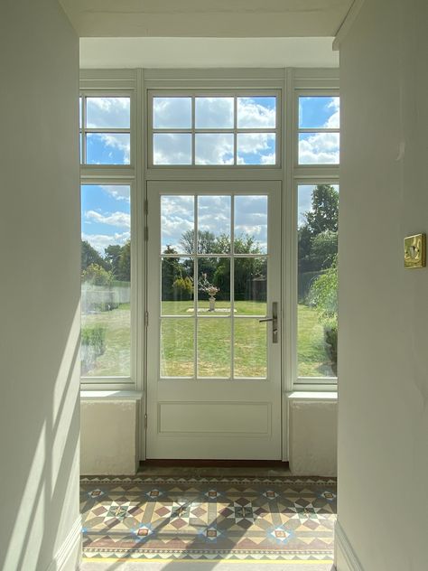 Timber door and window screen with Georgian bars looking out over a large garden. Georgian French Doors, Georgian Bars Window, Timber Entrance, Timber Screens, Window Screen, Timber Door, Entrance Ways, Door Sets, Window Screens