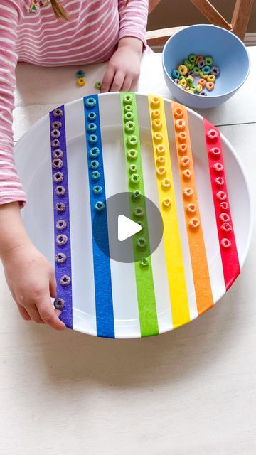 Brittany Bacharach on Instagram: "Save this STEM idea for St. Patrick’s Day! 

It’s low-prep, high engagement, and works on so many skills. 

You just need colored painters tape, a bowl or container, and Fruit Loops (comment ‘supplies’ for tape and bowl links). 

For younger kiddos, they can problem solve and try to figure out how to get cereal to balance. It’s a little harder than it looks 😉

For older kiddos, you can extend the learning and add in elements of graphing, comparing, building, and more! 

Follow us for more STEM and learning activities!" Fruit Loop Crafts Preschool, Fruits Day Activities For Kids, Food Activities, St Pats, Fruit Loops, St Patrick's Day Crafts, Spring Theme, Painters Tape, Holiday Treats