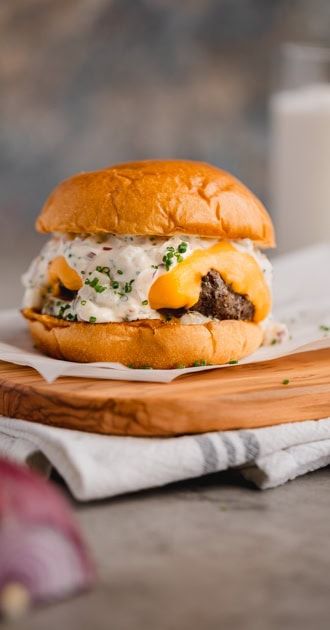 Our Wagyu Truffle Burger is a celebration of flavor. With a juicy Wagyu beef patty, oozy Velveeta cheese, and a hint of truffle, this burger offers a twist on a classic favorite. Great for summer! Tailgate Burgers, Blended Coffee Recipes, Truffle Aioli, Wagyu Beef Burger, Truffle Burger, Tailgate Recipes, Black Truffle Oil, Wagyu Burger, Honey Garlic Pork Chops