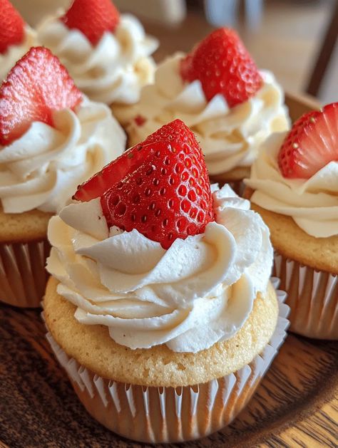 Who can resist the combination of strawberry and cheesecake? These Strawberry Cheesecake Cupcakes are a delightful twist on the classic dessert, creating a perfectly portioned treat that's both visually stunning and mouthwateringly delicious. With a moist cupcake base, a creamy cheesecake filling, and a rich whipped cream frosting, this recipe captures the essence of summer in every bite.... Easy Strawberry Shortcake Cupcakes, Strawberry Cream Cheese Cupcakes, Cheesecake Stuffed Cupcakes, Cheesecake Filled Cupcakes, Strawberry Filling For Cupcakes, Shortcake Recipe Easy, Strawberry Shortcake Recipe Easy, Strawberry Filled Cupcakes, Strawberry Shortcake Cupcakes