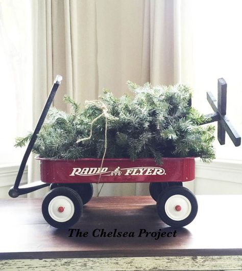 I was looking for a unique Christmas decoration for my coffee table.  At the same time, I ran across this Radio Flyer in the basement that didn't have a holiday… Rustic Christmas Tree Skirts, Radio Flyer Wagon, Christmas Mini Sessions, Radio Flyer, Christmas Tabletop, Unique Christmas Decorations, Red Wagon, Handmade Christmas Tree, 12 December