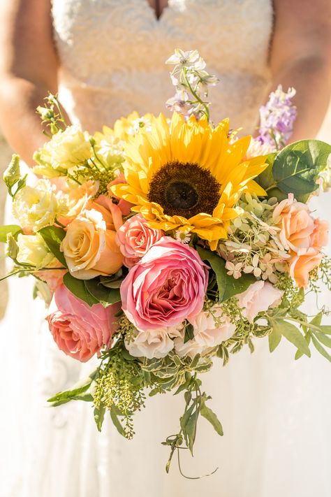 Sunshine, brisk air, sunflowers, and roses were the order of the day at this beautiful refined rustic wedding at Allen Hill Farm in Brooklyn, CT.  Flowers by BLOOM. Creative Floral & Events Photography by Trailing Twine Photography Sunflower And Peach Rose Bouquet, Peonies And Sunflowers Bouquet, Pink Sunflower Wedding, Sunflower And Pink Bouquet, Pink Sunflower Bouquet, Sunflower Pink Bouquet, Sunflower And Peony Bouquet, Sunflower And Roses Bouquet, Pink And Yellow Wedding Theme