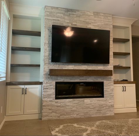 Brick Entertainment Center, Stone Entertainment Wall, Basement Entertainment Wall With Fireplace, Rectangle Fireplace With Tv Above, 85” Tv, Electric Fireplace Ideas With Tv Stone, Wall Entertainment Center With Fireplace, Stacked Stone Fireplace With Mantel, Built In Entertainment Center Fireplace