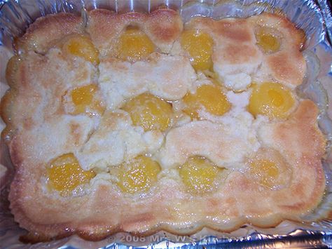 Poor Man's Peach Cobbler- easy and if you keep a can of peaches around, easy to whip up when the moment strikes:) Lazy Man Peach Cobbler Recipe, Peach Cobbler Pound Cake Pies And Tacos, Poor Man's Apple Cobbler, Poor Man's Peach Cobbler, Poor Mans Recipes, Vintage Oven Baked Peach Cobbler, Cobbler Easy, Peach Cobbler Easy, Dessert Recipies