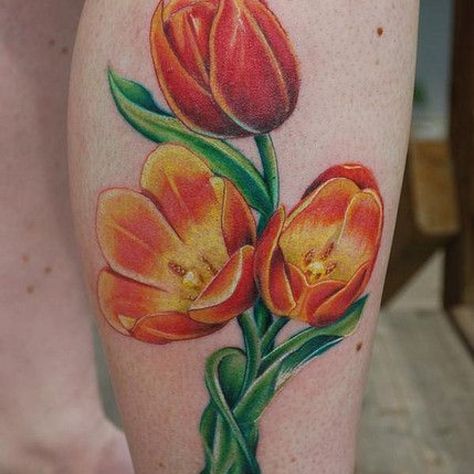 http://tattoomagz.com/colorful-tulip-tattoos/yellow-and-orange-tulip-tattoo/ Botanisches Tattoo, Marigold Tattoo, Tulip Tattoo, Botanical Tattoo, Girly Tattoos, Tattoos Gallery, Flower Tattoo Designs, Little Tattoos, Creative Tattoos