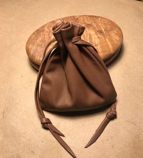 "This leather drawstring pouch bag is so soft and supple and will only get better with age. Made using Italian Lambskin leather.  This leather is hand selected to ensure you are getting the very best quality when I make my products. Color -Light Brown Medium Pouch - Over all size approx - 6. 1/2\" H X 5 1/2\"W.Pull draw string to close at top. Back to shop - http://www.etsy.com/shop/shirlbcreationstoo Read Customer Reviews from Shirlbcreationstoo customers here: http://www.etsy.com/people/onered Leather Drawstring Pouch, Custom Drawstring Bags, Distressed Leather Bag, Spirit Bags, Mens Pouch, Leather Drawstring Bags, Mens Leather Necklace, Medicine Pouch, Pouch Bags