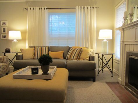 curtains disguise off center window Couch Off Center Window, Window Behind Couch, Behind Couch Ideas, Off Center Window, Curtain Small Window, Living Room Budget, Off Center Windows, Backyard Living Room, Small Basement Remodeling