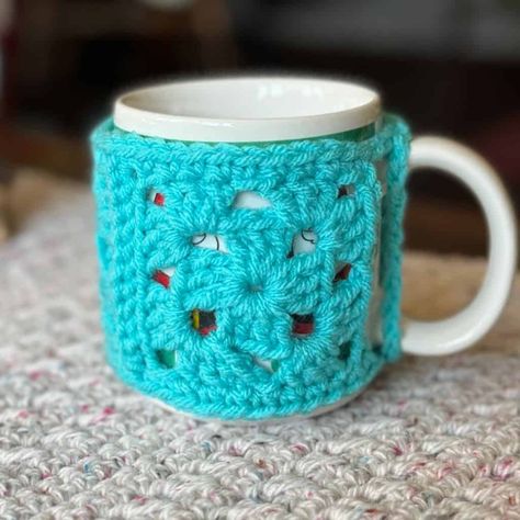 Photo of a crochet mug cozy Mug Cozy Crochet, Mug Cozy Pattern, Crochet Mug, Crochet Mug Cozy, Crochet Ornament Patterns, Cozy Pattern, Sparkle Yarn, Coaster Pattern, Crochet Cozy