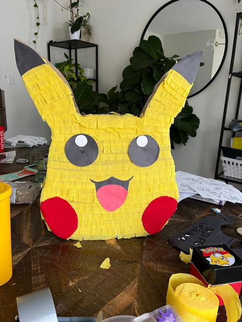 <p>For my 8-year-old son’s birthday this year, I pulled off a super fun Pokemon party, which featured tons of Pokemon games, a balloon arch, Pokeball party favours, and a cool homemade Pikachu pinata! I have to tell you; that pinata was a hit! It was such a simple and budget-friendly project, too. To make your own …</p> <p class="read-more"> <a class="" href="https://hanashappyhome.com/seasonal/birthdays/diy-pokemon-pinata/"> <span class="screen-reader-text">How to make you own Pokemon ... Pikachu Pinata, Pokemon Pinata, Pokemon Party Games, Diy Pikachu, Make Your Own Pokemon, Pokemon Birthday Party Ideas, Pokemon Balloons, Pokemon Party Decorations, Pokemon Decor