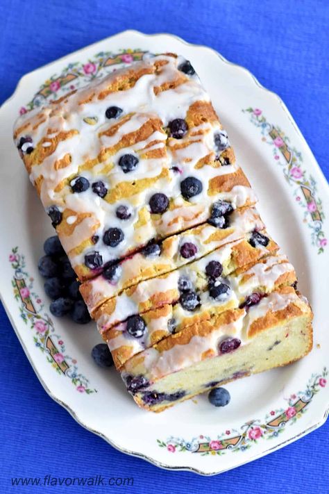 This Gluten Free Lemon Blueberry Bread is tender, moist, and a perfect combination of tart lemon and sweet blueberries. An easy recipe for a delicious blueberry lemon loaf, sweetly topped with lemon glaze, and great for breakfast or dessert. Blueberry Lemon Loaf, Sliced Lemon, Gluten Free Pastry, Lemon Blueberry Bread, Lemon Loaf, Blueberry Bread, Lemon Glaze, Homemade Gluten Free, Coffee Cakes