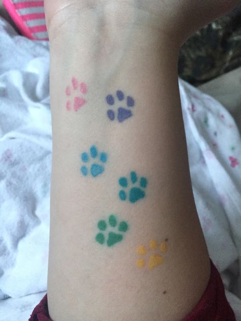 Rainbow paw print tattoo #rainbow #pawprinttatto #tattoos #dogtattoo Rainbow Cat Paw Tattoo, Color Paw Print Tattoo, Colorful Paw Print Tattoo, Rainbow Paw Print Tattoo, Rainbow Cat Tattoo, Bridge Tattoo Ideas, Impressive Tattoos, Keywest Kitten, Traditional Japanese Tattoo Sleeve