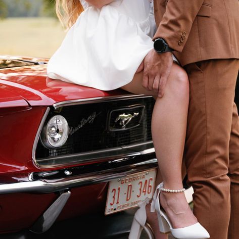 Still obsessing over this engagement shoot with one of our upcoming brides! It’s so fun to have a styled shoot with props, and the photos turn out like a dream! We cannot wait for this wedding next month for this lovely couple! Photographer: @tagsphotography #weddings #weddingplanning #weddingplanner #2024brides #2025brides #weddingseason #weddingcontent #weddinginspiration #atlantaweddings #atlweddingplanner #georgiaweddings #atlantabrides #atlweddings #atlantaeventplanner #georgiaev... Muscle Car Couple Photoshoot, Engagement Photos Mustang, Race Car Engagement Photos, Race Car Wedding, Engagement Shoot Props, Hot Rod Wedding, Car Themed Wedding, Car Engagement Photos, Car Wedding