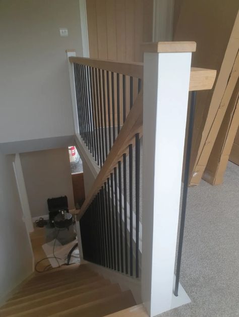 Stairs Bannister Ideas, Diy Banister Railing, Wood And Iron Stair Railing Modern, Stairs Banister Ideas, Stair Banister Makeover, Black And Wood Staircase, Staircase Spindle Ideas, Wood And Metal Stair Railing, Upstairs Banister