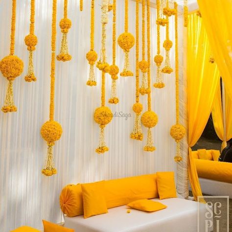 Photobooth To Mandap: Best Ways To Use Genda Phool in Wedding Decoration | ShaadiSaga Genda Phool Decoration, Photobooth Decoration, Mandap Wedding, Haldi Decoration Ideas, Haldi Ceremony Decorations, Engagement Stage Decoration, Mehendi Decor Ideas, Expensive Flowers, Wedding Background Decoration