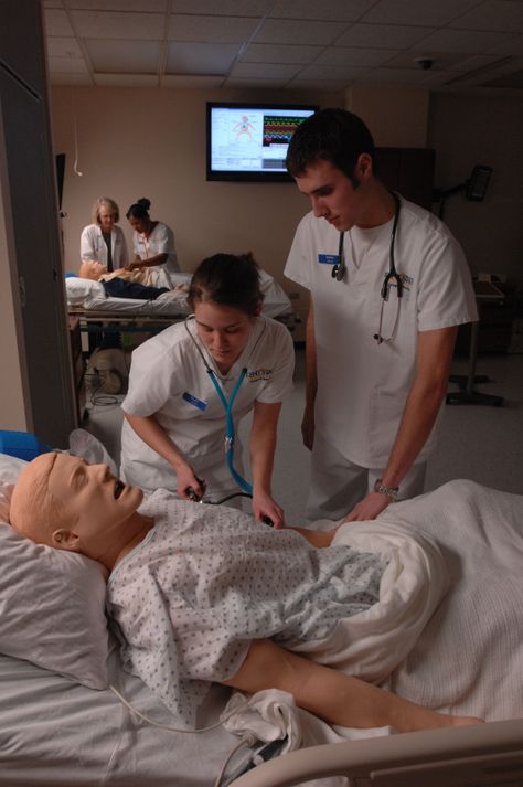 Two Kent State Nursing students work in the Olga A. Mural simulation lab in Henderson Hall. The "patients" in the sim lab have heartbeats, breathing and other features which help the students learn.  Photo taken by Gary Harwood on March12, 2008. Air Force Nurse, Patient Care Tech, Crna School, Nursing Goals, Student Centered Learning, College Nursing, Lecture Hall, Kent State, Physician Assistant