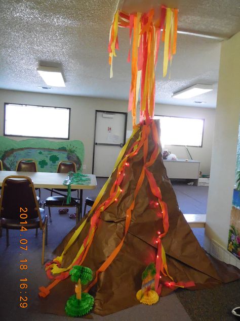 Volcano Vbs Decorations, Volcano Room Transformation, Moana Hallway Decorations, Volcano Party Decoration, Volcano Decoration Party Ideas, Dinosaur Vacation Bible School, Diy Volcano Decoration, Lava Lava Luau Vbs Decorations, Cardboard Volcano