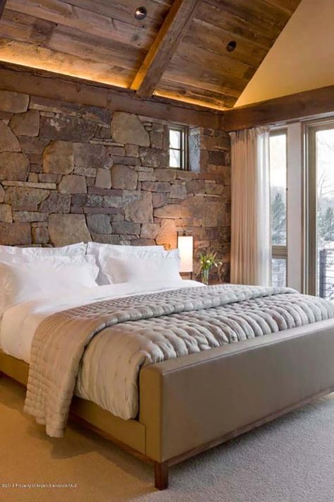 Morningstar Residence located  on the Fork River, Aspen, Colorado......desined by Zone 4 Architects, built by Brikor Asscoiates....... Stone Wall Interior Design, Stone Walls Interior, Rustic Bedroom Design, Modern Farmhouse Bedroom, Stone Interior, Modern Rustic Homes, Stone Walls, Interior Wall Design, Trendy Bedroom