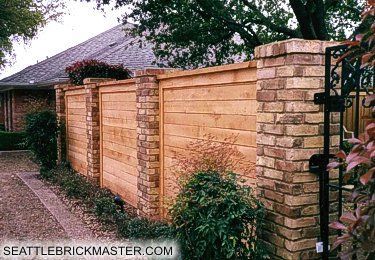 Wooden Fence With Brick Pillars, Wood Fence On Top Of Cinder Block Wall, Fence With Columns, Wood Fence With Brick Columns, Brick Wood Fence, Brick And Wood Fence Ideas, Wood And Brick Fence, Diy Brick Fence, Brick Pillar Fence