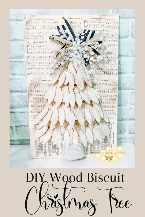 Create your own elegant wood biscuit Christmas tree this holiday season. Grab a tree from Dollar Tree and find some old Christmas Hymn pages. Add some rustic wood biscuits and top it off with an easy rag bow. It will look great on your own mantle or make a thoughtful gift for a friend. Wood Biscuit Christmas Tree, Wood Biscuits Crafts, Biscuit Christmas Tree, Shim Crafts, Wood Joining, Wood Biscuits, Wooden Churches, Upcycle Wood, Biscuit Ideas