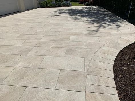 Another outstanding project with our Vehicular Porcelain 3cm Quartz Beige. 👍👍 No more Oil Stains 👍👍 No more Clean/Seal 👍👍 Large Formats 👍👍 Modern Look 👍👍 Save Thousands 3cm Porcelain Pavers for Driveways Now In Stock hardscape.com/lp/new-3cm Driveway Tiles Modern, Beige Driveway, Large Format Pavers, Large Paver Driveway, Backyard Townhouse, Driveway Pavers Extension, Side Of Driveway Landscaping, Driveway Tiles, Driveway Landscaping Ideas