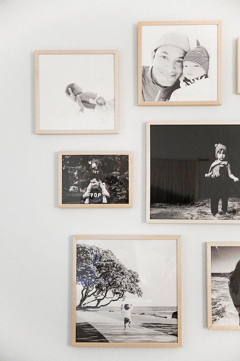 A bedroom gallery wall of black and white family photos in Simply Framed Natural Gallery Frames by photographer Max Wanger. Nursery Nook, Farmhouse Gallery Wall, Picture Frame Mat, Collage Foto, Family Photo Wall, Framed Photos, Dekor Diy, Gallery Wall Frames, Wall Gallery