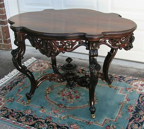 Features include the beautiful rosewood top, the laminated rosewood skirt with finely carved roses on all four side, a pair of carved rosebuds on the kness of all four reticulated cabriole legs, and a beautiful up and down lobed finial in the center of the reticulated stretcher. 1890s Furniture, Victorian Coffee Table, Victorian Furniture Decor, Table Interior Design, Pretty Furniture, Painting Wooden Furniture, Victorian Home Interior, Victorian Table, Dream Furniture