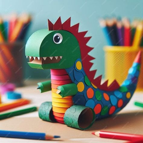 Premium Photo | Colorful Handmade Dinosaur Toy from Recycled Materials Toys Made Of Recycled Materials, Handmade Dinosaur, Toy Factory, Toilet Paper Roll Crafts, Paper Roll Crafts, Crafts Paper, Stationery Templates, Dinosaur Toys, Business Card Maker