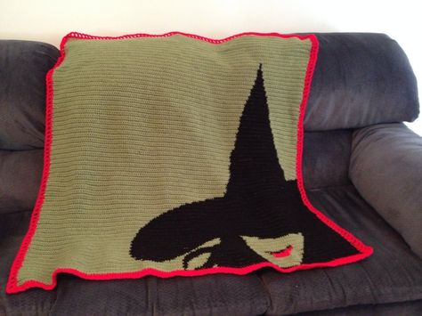 This hand crocheted "Wicked" blanket is for sale if anyone is interested! Wicked Crochet, Haunted Mansion Crochet Pattern, Crochet Wizard Of Oz, Wizard Of Oz Crochet Patterns, Wizard Of Oz Crochet Blanket, Wizard Of Oz Cross Stitch, Crochet Knit Blanket, Crochet Cat Pattern, C2c Crochet