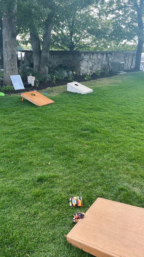 Corn Hole Aesthetic, Corn Hole Birthday Party, Grad Party Yard Games, Summer Party Outside, Outdoor Games Aesthetic, Lake Graduation Party Ideas, Summer Backyard Aesthetic, Backyard Summer Aesthetic, Backyard Birthday Aesthetic