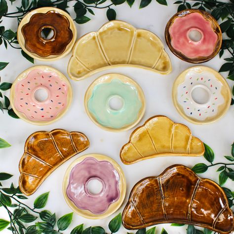 These sweet little dishes are just right for holding your jewelry or use as a little spoon rest, salt or spices, teabag holder, vitamin dish, office organization or anything else you can think of...Perfect for the bakery lover in your life.  Handmade in California Each one of a kind dish is hand sculpted from smooth stoneware clay & glazed in a variety of bright and cheery glazes. THIS IS FOR ONE (1) DISH - READY TO SHIP Approximate measurements: Donut: 3.75 inches diameter Small Croissant: 5 inches by 2.5 inches  Large Croissant: 6.5 inches by 3.5 inches As with all my handmade pottery...every piece has its own unique handmade character and may have slightly different sizes, shapes and color variations. I never use molds and make each, one at a time. I always use lead free glaze & high fi Pottery Trinket Dish, Clay Croissant, Clay Jewelry Tray, Clay Donut, Clay Trinket Dish, Paper Flower Wall Art, Teabag Holder, Clay Dish, Cute Bakery