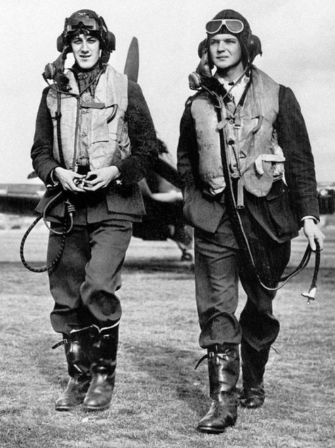 AM photographer Cecil Beaton visited No 249 Squadron RAF at RAF North Weald in September 1940 and captured P/O James RB "Jim" Meaker (left) and P/O Percival R-F "Percy" Burton as they walked away for a post-sortie debrief. The pilots were relative newcomers, having arrived on 27 June and 21 July respectively, both perishing in combat in Hurricane Mk I GN-N and GN-H on the morning of 27 September. Vintage Showroom, Ww2 Uniforms, Air Force Pilot, Wwii Fighters, Wwii Photos, British Aircraft, Battle Of Britain, Ww2 Aircraft, Fighter Pilot