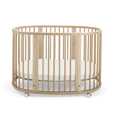 The Best Baby Cribs in 2022 | domino Stokke Crib, Stokke Sleepi Crib, Flexible Bed, Oval Crib, Bed Extension, Stokke Sleepi, Mini Crib Bedding, Best Baby Cribs, Best Crib