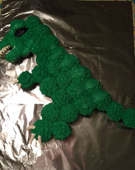 T-Rex cupcake cake                                                                                                                                                                                 More Trex Cupcake Ideas, T Rex Cupcake Cake, Three Rex Cupcake Cake, Trex Cupcake Cakes, Dinosaur Cake Out Of Cupcakes, T Rex Cupcake Cake Pull Apart, Number 3 Cupcake Cake Dinosaur, Dinosaur Cupcake Cake, T Rex Cake