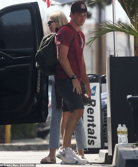 Miles Teller spent quality time with his wife Keleigh Sperry and several of his Top Gun: Maverick castmates while boarding a plane in Los Angeles on Saturday afternoon.The 35-year-old performer was captured chatting with co-star Glen Powell while making his way towards the airplane.The group were reportedly headed to San Diego, where the original Top Gun film took place. Miles Teller And Glen Powell, Glen Powell And Miles Teller, Miles Teller And Wife, Vinny Pazienza Miles Teller, Miles Teller Baseball, Miles Teller And Keleigh Sperry, Miles Teller Rooster, Keleigh Sperry, Boarding A Plane