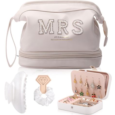 PRICES MAY VARY. Comprehensive Package: the package include 1 piece of wedding bride cosmetic bag, 1 piece of bride jewelry case, 1 piece of hair clip, 1 piece of hair scrunchie, and 2 sets of MRS embroidered letters( DIY accessories) which caters to various needs, making it an ideal gift for brides Large Capacity: the bride makeup bag leather comes in a large size, measuring approx. 9.84 x 5.91 x 7.48 inches, designed with double layers and with a handy handle, easy to carry, and it can store c Soon To Be Bride Gifts, Honeymoon Toys, Bridal Shower Gifts For Bride Baskets, Bride Gifts From Bridesmaid, Gift For Bride From Bridesmaid, Bachelorette Gifts For The Bride, Bride Bachelorette Gift, Bride Basket, Bride Wedding Makeup