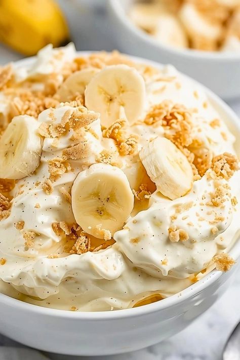 Dreamy banana pudding fluff is the perfect no-bake dessert for your next potluck or party. It comes together in minutes, and it's impossible to resist. Banana Pudding Fluff, Banana Fluff, Pudding Fluff, Easy Peanut Brittle Recipe, Fluff Salad Recipes, Banana Pudding Desserts, Peanut Brittle Recipe, Easy Banana Pudding, Fluff Salad