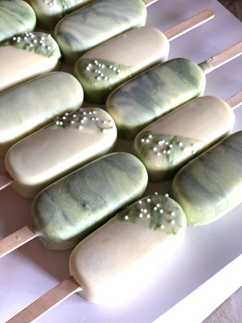 Sage Green Cakesicles, Sage Green Desserts, Green Wedding Food, Green Cakesicles, Marble Cakesicles, Sage Green Dessert Table, Green Marble Cake, Safari Birthday Party Decorations, Green Desserts