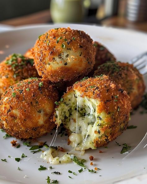 BROCCOLI CHEESE BALLS 🥦🧀 Ingredients: 2 cups broccoli florets, cooked and finely chopped 1 cup shredded cheddar cheese 1/4 cup grated Parmesan cheese 1/2 cup breadcrumbs (plus extra for coating) 2 large eggs, lightly beaten 1 clove garlic, minced 1/2 tsp onion powder 1/2 tsp paprika Salt and black pepper to taste 1/4 cup all-purpose flour Vegetable oil (for frying) Directions: Step 1: Prepare the Mixture In a large mixing bowl, combine the finely chopped broccoli, shr... Large Food Ideas, Interesting Dinner Recipes, Broccoli Cheese Balls, Fried Cheese Balls, Food Prep Ideas, Fried Balls, Garlic Food, Cheese Bowl, Cozy Food