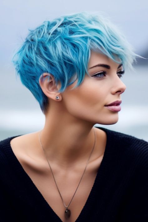 The ocean blue pixie with feathered layers is truly eye-catching. It works wonders for those with fine hair, as it adds layers to create a stylishly tousled look. Click here to check out more cute pixie haircuts trending for 2023. Blue Coloured Hair, Short Blue Hair Pixie, Pixie Cut Hair Color, Short Coloured Hair, Feathered Pixie Haircut, Blue Pixie Cut, Short Hair With Bangs Ideas, Blue Hair Short, Trending For 2023