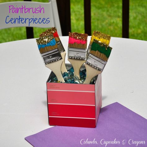 Art Party Paintbrush Centerpieces  (Easy and Inexpensive!)   From Cobwebs, Cupcakes And Crayons Party Centerpiece Ideas, Housewarming Party Decorations, Art Themed Party, Maker Fun Factory, Mitzvah Decor, Party Centerpiece, Art Birthday Party, Art Theme, Centerpiece Ideas