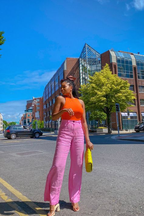 Orange top and pink trousers summer style Orange Top And Pink Pants Outfit, Neon Pink Jumpsuit, Neon Pink Pants Outfit, Pink Orange Green Outfit, Neon Orange Top Outfit, Pink And Orange Aesthetic Outfit, Orange Top Outfit Aesthetic, Bright Pink Pants Outfit, Pink Trousers Outfit Casual