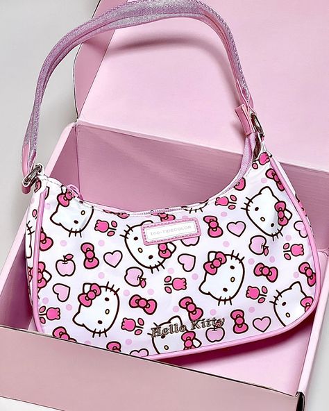 Genuine Hello Kitty Purse in stock🎀🌸 This bag Hello Kitty Purse is a stylish hobo bag, perfect for carrying your essentials. $350TTD Genuine Product Dimensions : 25cm x 6cm x 17cm + 21cm for strap Large enough to fit your phone hair clips makeup & essentials To get yours visit www.the21suns.com🎀 Follow @the21suns for more cute Sanrio and anime finds🌷 #hellokitty #kawaii #kawaiifashion #sanrio #hellokittycollector Bag Packs, Hello Kitty Purse, Fashion Purses, Cute Sanrio, Hello Kitty Bag, Girly Bags, Fashion Wallpaper, Hello Kitty Items, Birthday List