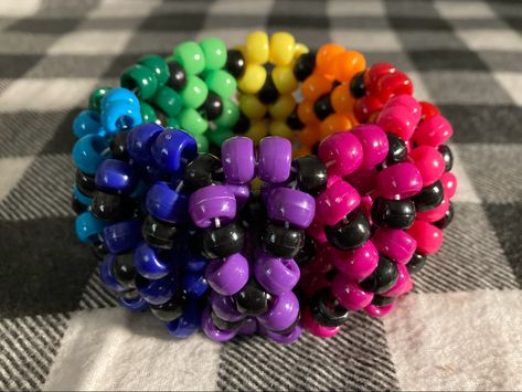 @kandivoid on etsy Kandi Patterns Bracelets, Rainbow Kandi, Arcade Carpet, Kandi Cuff Patterns, Kandi Inspo, Scary Kids, Diy Kandi Bracelets, Diy Kandi, Beaded Braclets